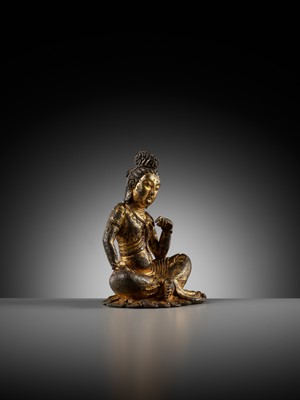 Lot 60 - A GILT BRONZE FIGURE OF GUANYIN, PROBABLY TANG DYNASTY