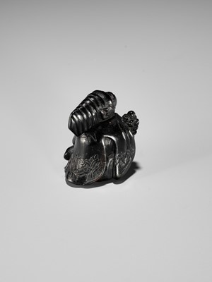 Lot 450 - A CHARMING KUROGAKI (BLACK PERSIMMON) WOOD NETSUKE OF A MONKEY AS A SAMBASO DANCER