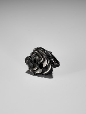 Lot 450 - A CHARMING KUROGAKI (BLACK PERSIMMON) WOOD NETSUKE OF A MONKEY AS A SAMBASO DANCER