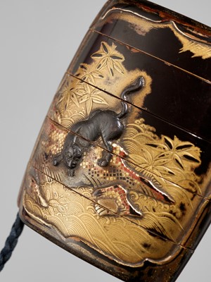 Lot 6 - A FINE SILVER-INLAID FOUR-CASE LACQUER INRO DEPICTING A TIGER AND DRAGON