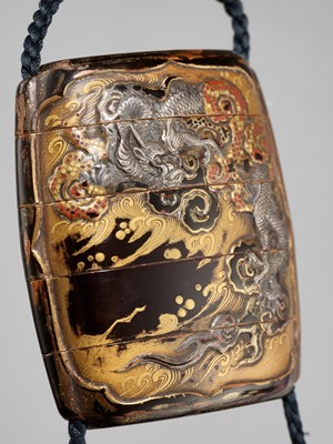 Lot 6 - A FINE SILVER-INLAID FOUR-CASE LACQUER INRO DEPICTING A TIGER AND DRAGON