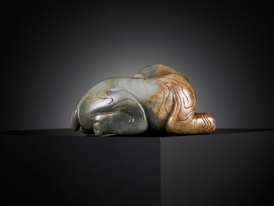 Lot 26 - A GRAY AND RUSSET JADE FIGURE OF A RECUMBENT ELEPHANT, LATE MING TO MID-QING DYNASTY
