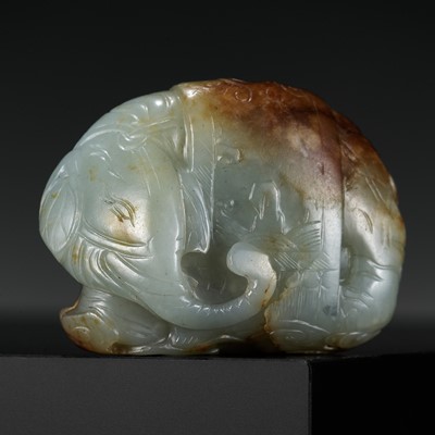 Lot 326 - A CELADON AND RUSSET JADE CARVING OF AN ELEPHANT, LATE MING TO MID-QING DYNASTY