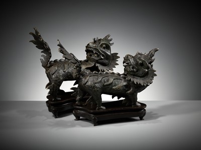 Lot 616 - A PAIR OF HEAVY BRONZE FIGURES OF QILIN, MING DYNASTY