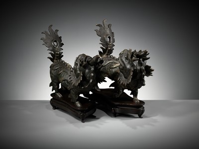 Lot 616 - A PAIR OF HEAVY BRONZE FIGURES OF QILIN, MING DYNASTY