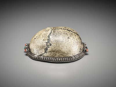 Lot 678 - A SILVER-MOUNTED ‘CITIPATI’ KAPALA WITH CORAL AND TURQUOISE CABOCHONS, TIBET, 18TH-19TH CENTURY