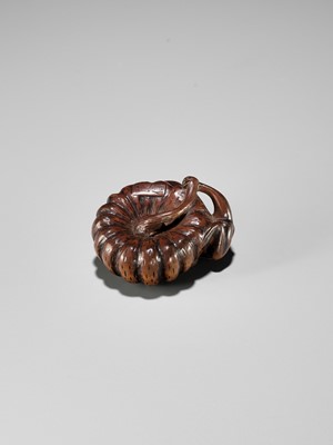 Lot 355 - TOMONOBU: A WOOD NETSUKE OF A FROG, NASUBI AND PUMPKIN