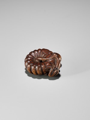 Lot 355 - TOMONOBU: A WOOD NETSUKE OF A FROG, NASUBI AND PUMPKIN