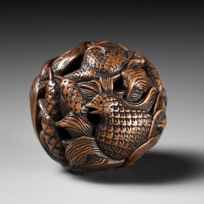 Lot 82 - MASANAO: A FINE WOOD NETSUKE DEPICTING AN AUTUMNAL SCENE OF QUAILS AND MILLET