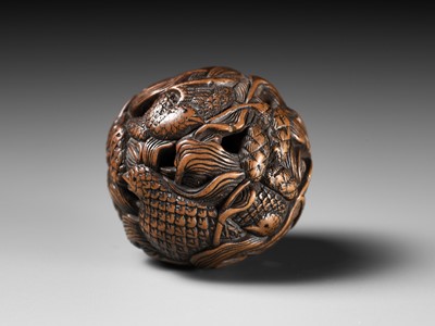 Lot 82 - MASANAO: A FINE WOOD NETSUKE DEPICTING AN AUTUMNAL SCENE OF QUAILS AND MILLET