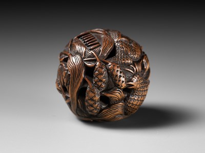 Lot 82 - MASANAO: A FINE WOOD NETSUKE DEPICTING AN AUTUMNAL SCENE OF QUAILS AND MILLET