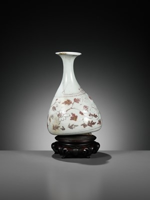 Lot 107 - A COPPER-RED-DECORATED SOLIFLORE VASE, JOSEON DYNASTY