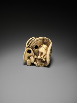 Lot 165 - AN AMUSING OSAKA SCHOOL IVORY NETSUKE OF SHOKI CAPTURING AN ONI, ATTRIBUTED TO HIDEMASA