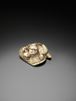 Lot 165 - AN AMUSING OSAKA SCHOOL IVORY NETSUKE OF SHOKI CAPTURING AN ONI, ATTRIBUTED TO HIDEMASA