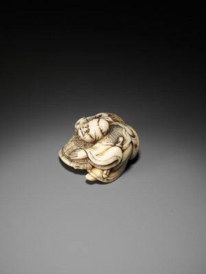 Lot 165 - AN AMUSING OSAKA SCHOOL IVORY NETSUKE OF SHOKI CAPTURING AN ONI, ATTRIBUTED TO HIDEMASA