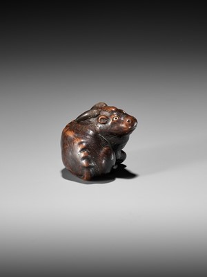 Lot 677 - MASAKAZU: A FINE WOOD NETSUKE OF A RECUMBENT