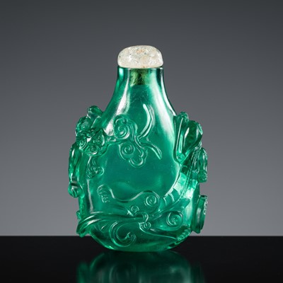 Lot 478 - AN EMERALD-GREEN BEIJING GLASS ‘CHILONG’ SNUFF BOTTLE, 1750-1820