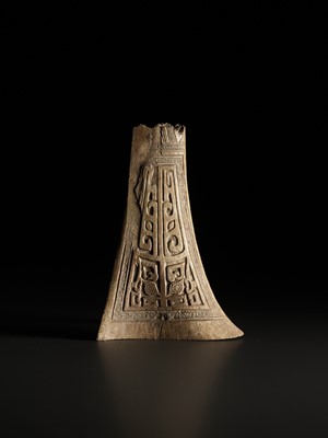 Lot 124 - AN ARCHAIC CEREMONIAL BONE CARVING, SHANG DYNASTY