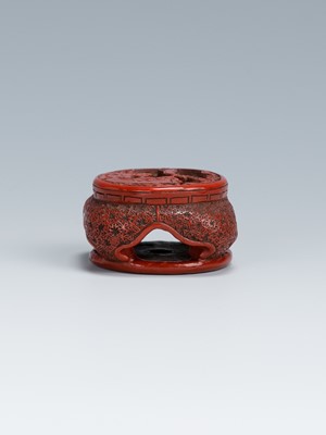 Lot 410 - A FINE TSUISHU LACQUER NETSUKE OF A CHINESE LOW TABLE DEPICTING KARAKO UNDER PINE