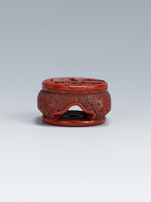 Lot 410 - A FINE TSUISHU LACQUER NETSUKE OF A CHINESE LOW TABLE DEPICTING KARAKO UNDER PINE