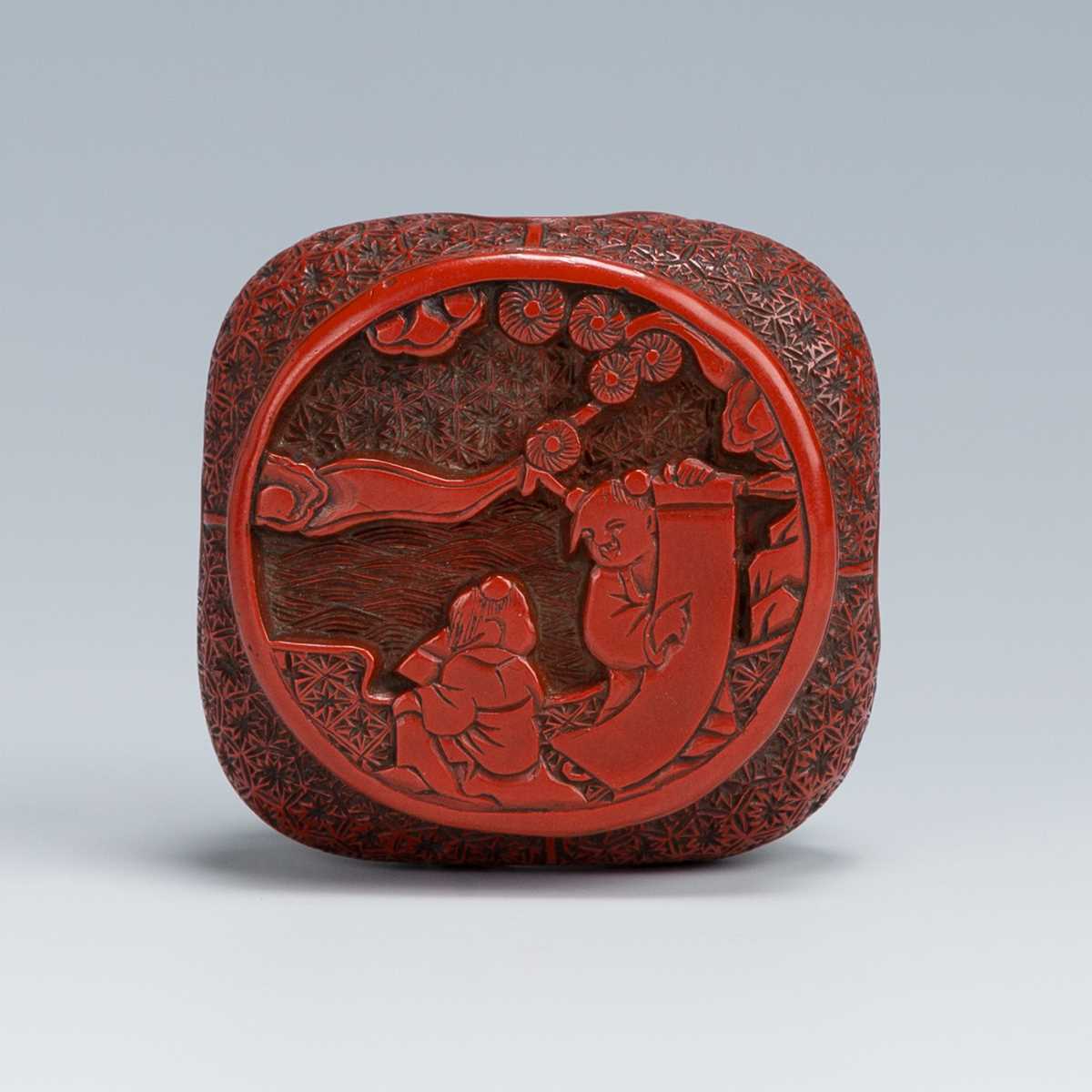 Lot 410 - A FINE TSUISHU LACQUER NETSUKE OF A CHINESE LOW TABLE DEPICTING KARAKO UNDER PINE
