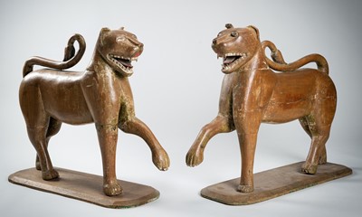 Lot 694 - A LARGE AND RARE PAIR OF WOODEN WILDCATS, MUGHAL EMPIRE