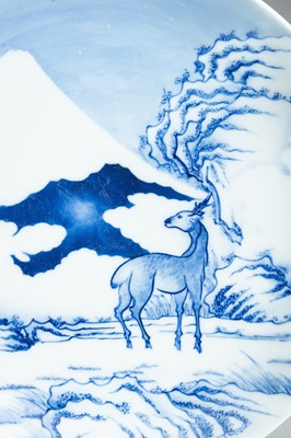 Lot 136 - A BLUE AND WHITE HIRADO PORCELAIN DISH WITH A DEER AND MOUNT FUJI, MEIJI