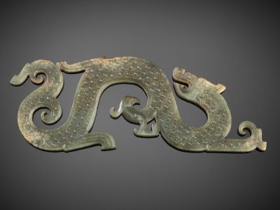 Lot 830 - A LARGE SEA-GREEN JADE 'DRAGON AND PHOENIX' PENDANT, WARRING STATES