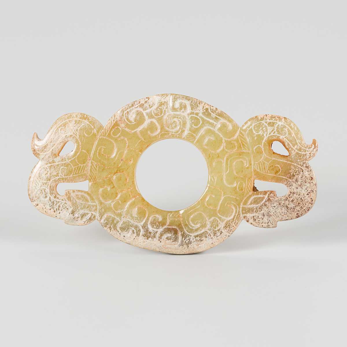 Lot 834 - A JADE DISK, BI, EASTERN ZHOU DYNASTY