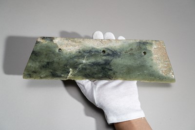 Lot 772 - A LARGE ARCHAIC GREEN JADE AXE BLADE, DAO, QIJIA CULTURE