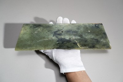 Lot 772 - A LARGE ARCHAIC GREEN JADE AXE BLADE, DAO, QIJIA CULTURE