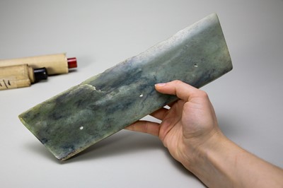 Lot 772 - A LARGE ARCHAIC GREEN JADE AXE BLADE, DAO, QIJIA CULTURE