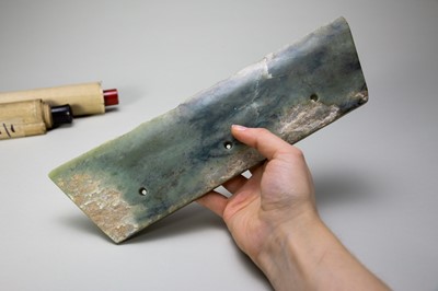 Lot 772 - A LARGE ARCHAIC GREEN JADE AXE BLADE, DAO, QIJIA CULTURE