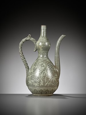 Lot 78 - A SLIP-INLAID ‘CHILDREN AND GRAPEVINES’ CELADON EWER, GORYEO DYNASTY (918-1392)