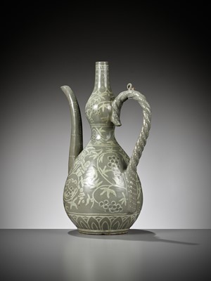 Lot 167 - A SLIP-INLAID ‘CHILDREN AND GRAPEVINES’ CELADON EWER, GORYEO DYNASTY (918-1392)