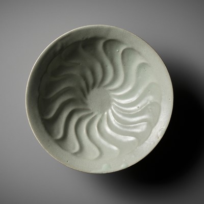 Lot 168 - A MOLDED AND CELADON-GLAZED ‘FLORAL’ BOWL, GORYEO DYNASTY, KOREA, 14TH CENTURY