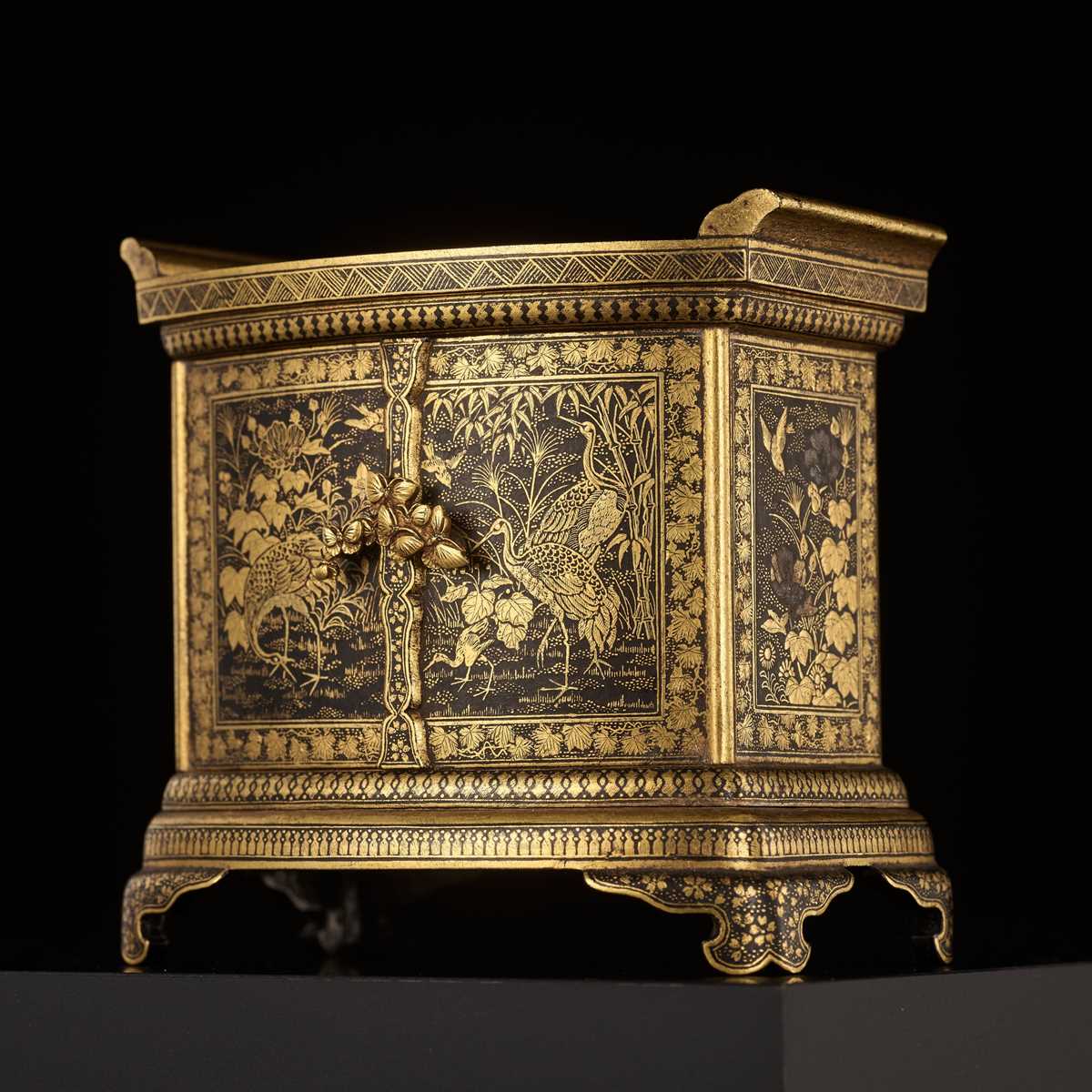 Lot 113 - KOMAI: A SUPERB GOLD-DAMASCENED IRON TABLE CABINET (KODANSU)
