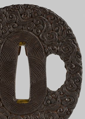 AN IRON TSUBA WITH SCROLLING CLOUDS