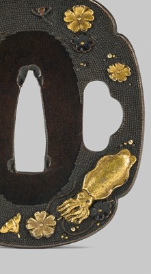 A FINE SHAKUDO TSUBA WITH CUTTLEFISH AND CHERRY BLOSSOMS