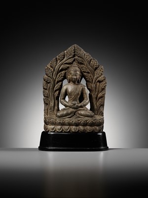 Lot 668 - A LIMESTONE FIGURE OF BUDDHA AMITABHA UNDER THE BODHI TREE, NEPAL, 17TH-18TH CENTURY
