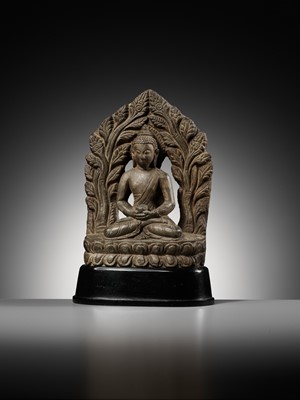 Lot 668 - A LIMESTONE FIGURE OF BUDDHA AMITABHA UNDER THE BODHI TREE, NEPAL, 17TH-18TH CENTURY