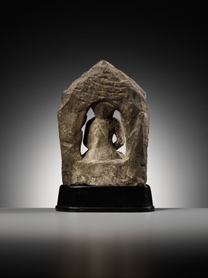 Lot 668 - A LIMESTONE FIGURE OF BUDDHA AMITABHA UNDER THE BODHI TREE, NEPAL, 17TH-18TH CENTURY