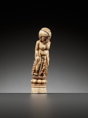 Lot 691 - A CARVED BONE KRIS HILT IN THE FORM OF A MALE DEMON, INDONESIA, 18TH-19TH CENTURY