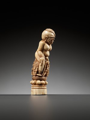 Lot 691 - A CARVED BONE KRIS HILT IN THE FORM OF A MALE DEMON, INDONESIA, 18TH-19TH CENTURY