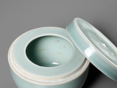 Lot 131 - A CELADON-GLAZED LOTUS POD-FORM BOX AND COVER, QING DYNASTY