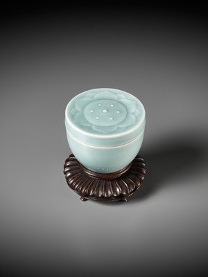 Lot 131 - A CELADON-GLAZED LOTUS POD-FORM BOX AND COVER, QING DYNASTY