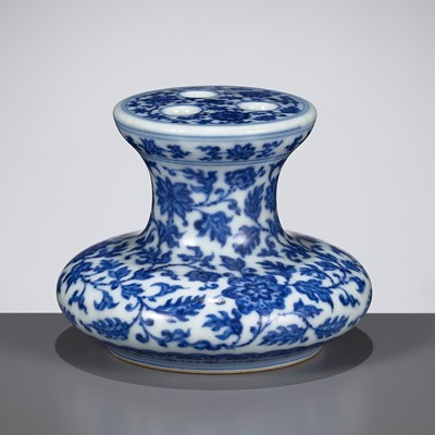 Lot 213 - A BLUE AND WHITE MING-STYLE FLOWER-HOLDER, QIANLONG MARK AND PERIOD