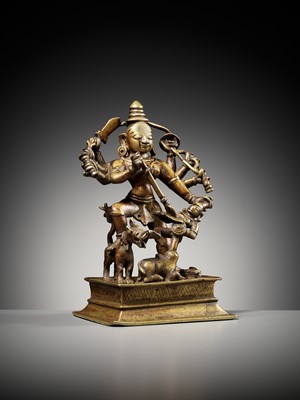 Lot 730 - A BRASS FIGURE OF DURGA MAHISHASURAMARDINI, INDIA, 16TH-17TH CENTURY