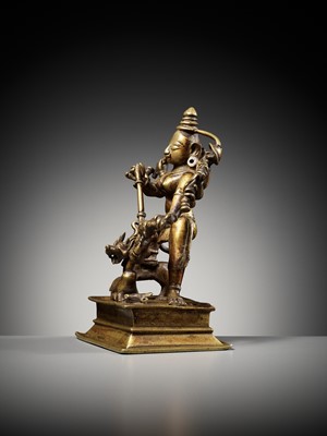 Lot 730 - A BRASS FIGURE OF DURGA MAHISHASURAMARDINI, INDIA, 16TH-17TH CENTURY