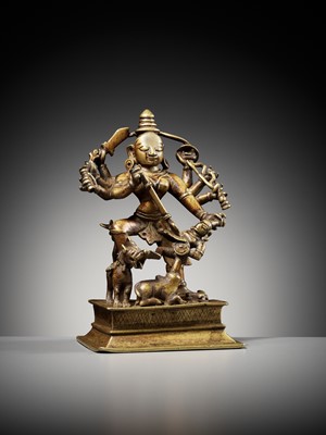 Lot 730 - A BRASS FIGURE OF DURGA MAHISHASURAMARDINI, INDIA, 16TH-17TH CENTURY